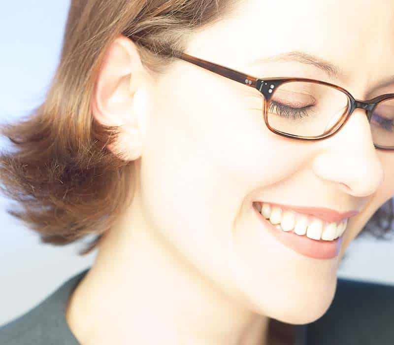 smiling woman eyeglasses